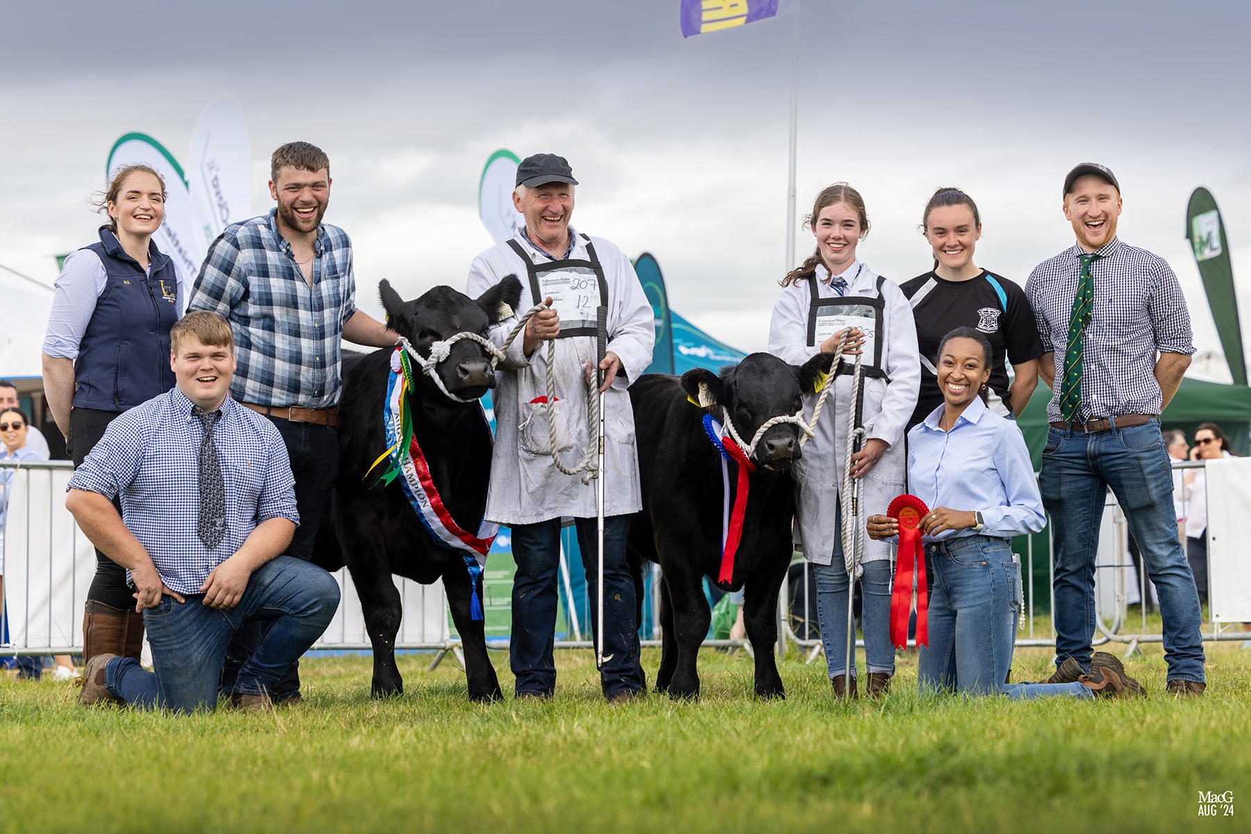 Liss team at a show with two calves